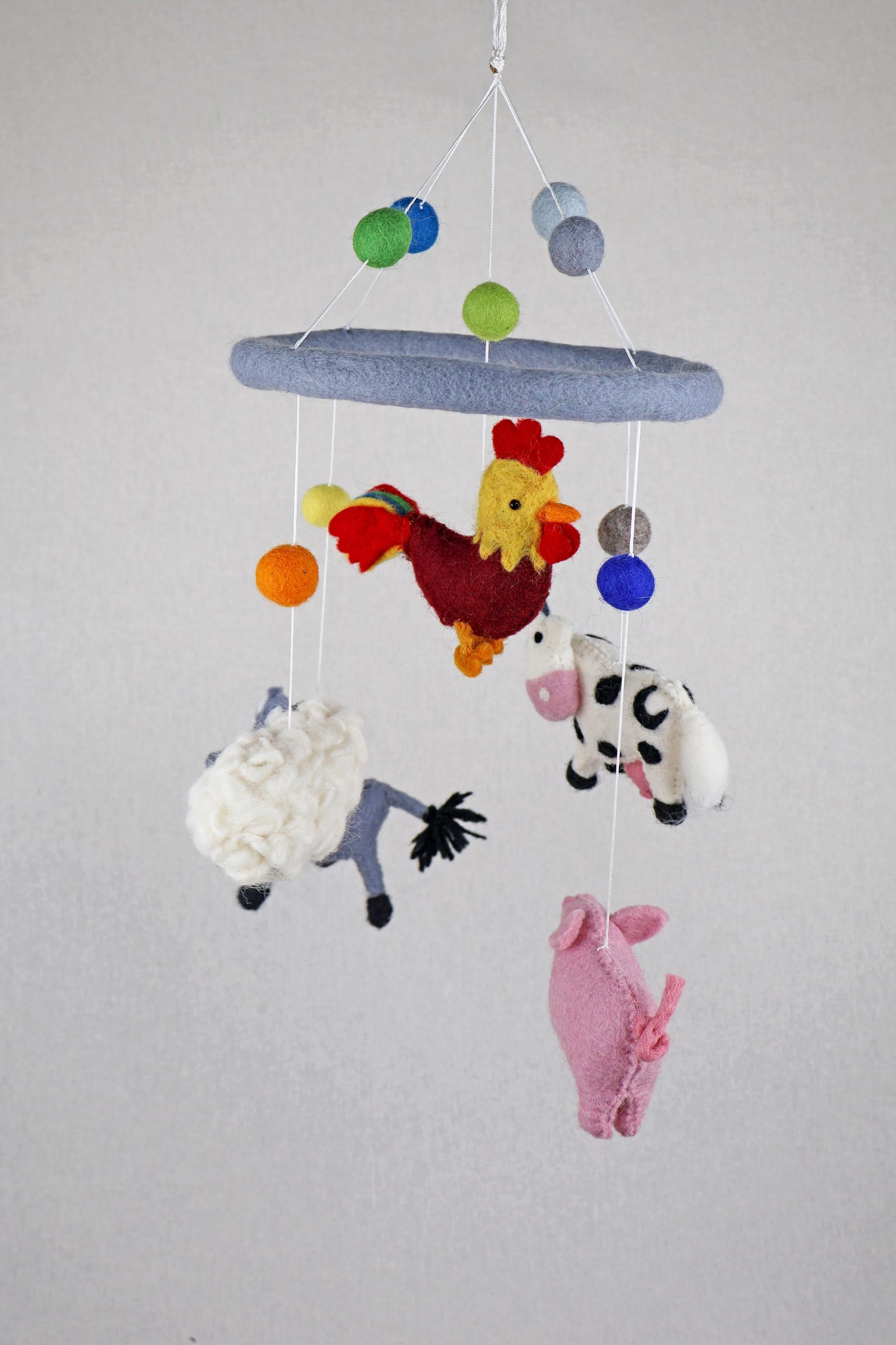 Mobilé Bauernhof, Kinderzimmer, Filz, Schwein, Esel, Hahn, Kuh, Babyzimmer, Kindergarten, Wolle, Schafswolle, Dekoration, Babybett, Geburt